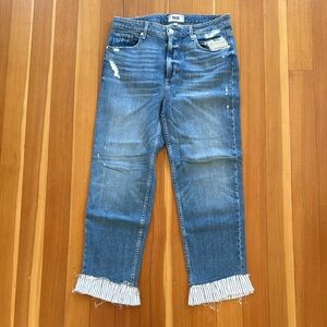 Gently worn sold out Paige slim leg jeans with black & white stripe frilled hem